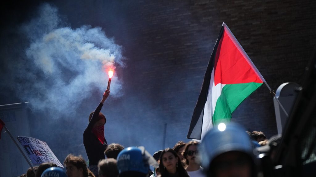 Pro-Palestinian protesters arrive at Italian soccer training centre to oppose the game vs Israel