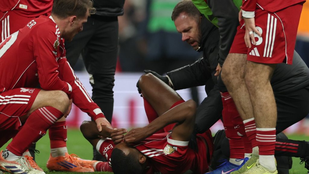Isak injures ankle while scoring for Liverpool against Tottenham