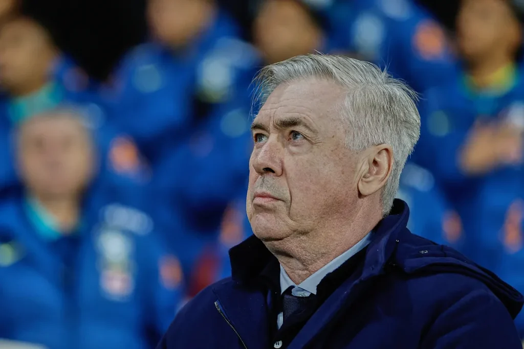 Carlo Ancelotti makes Bernab stand up after singing the Real Madrid national anthem