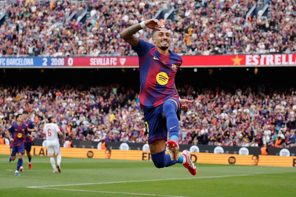 Rafinha scores a hat-trick as Barcelona beat Sevilla 5-2 and remain four points clear of Madrid.