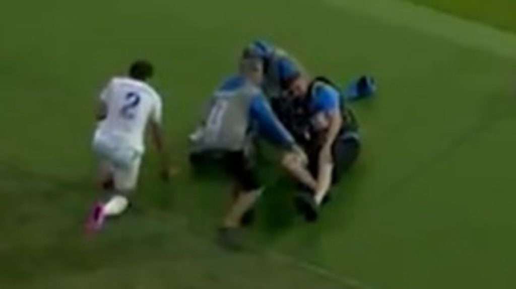 Medical workers rush to World Cup cameraman after live collision with Man City star