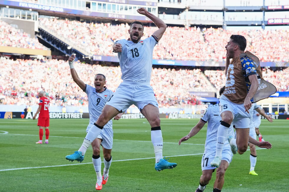 Hussein, who was detained by US customs two weeks ago, scores on his World Cup debut for Iraq