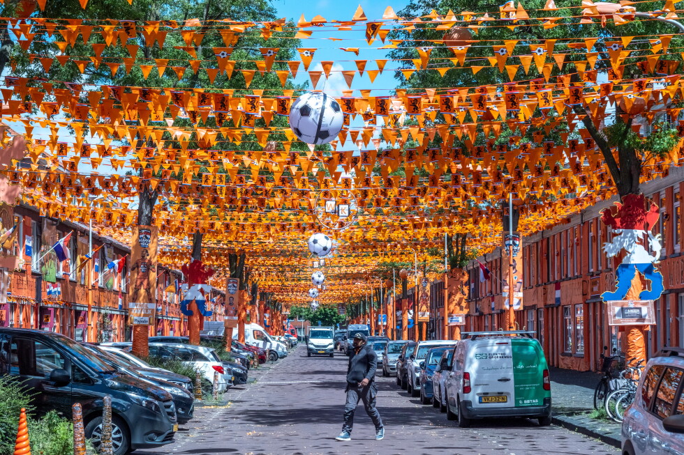 Orange fans sprinkle Dutch colors on the streets of The Hague